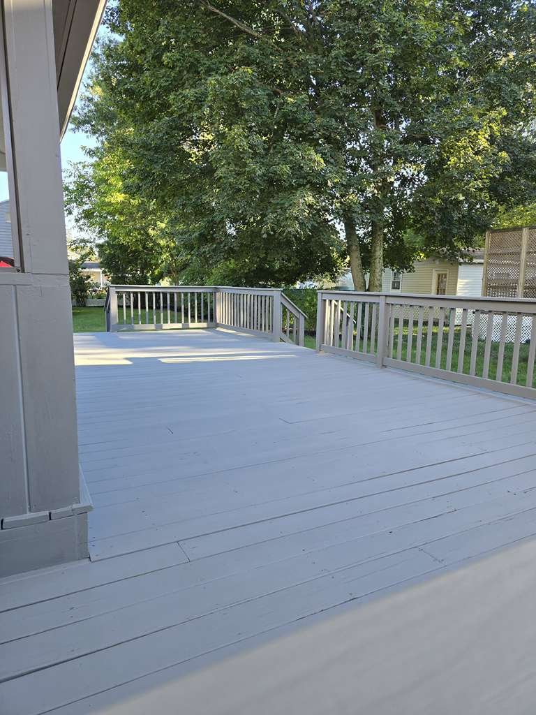Exterior deck painting project by WR Pro Painters